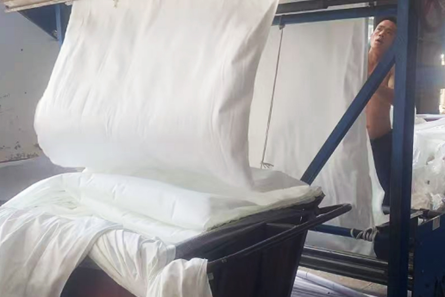 Boyama fabrikası üretimi-gri kumaş çevirme alanı